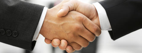 men shaking hands -two real estate offers same time