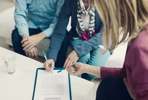 signing a contract - commitment letter