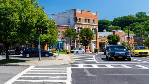 A Westchester village main street, which is the version of the suburbs most New Yorkers are actually picturing