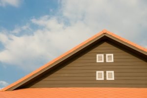 https://www.pexels.com/photo/orange-and-gray-painted-roof-under-cloudy-347152/
