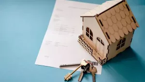 House model and contract prepared for an earnest money deposit