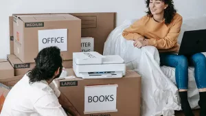 Seller packing a home after reviewing net proceeds