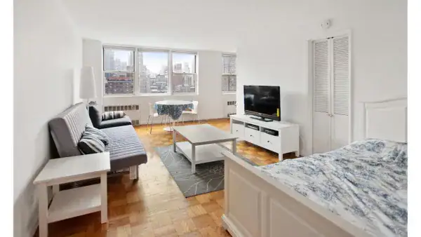 A studio where the sleeping alcove is set back from the living area