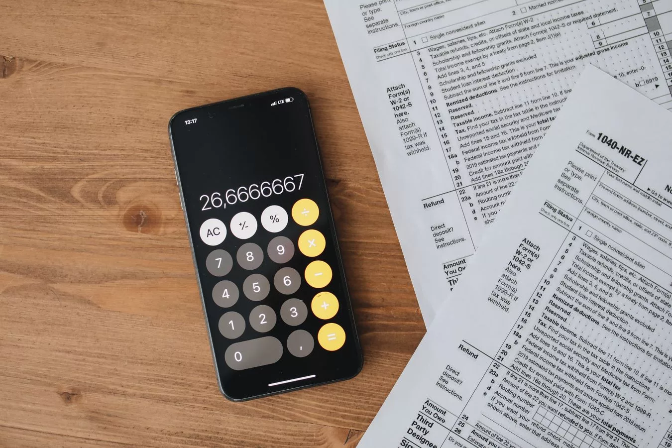 Reviewing a NYC property tax bill alongside a calculator to check assessed value and exemptions