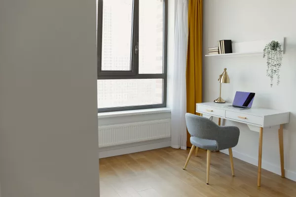 The fourth room used as a study. The window is the argument, the tape measure decides the rest