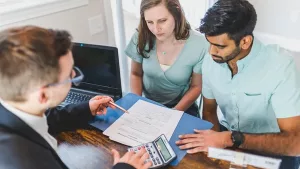 Buyer reviewing condominium financing documents