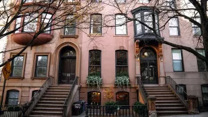 A row of New York City brownstones with stoops