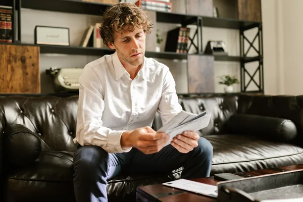 A first-time buyer researching down payment assistance programs at a laptop