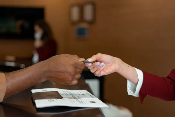 A buyer's attorney delivering a signed contract with an earnest money check into escrow
