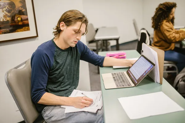 A first-time buyer working through a homebuyer education course before applying for assistance