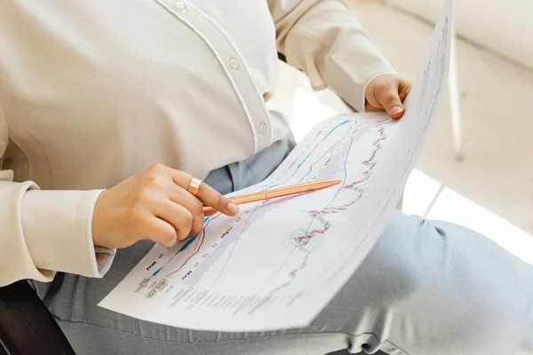 A buyer reviewing days-on-market and price-history data before negotiating in NYC