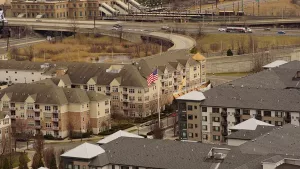 A suburban New Jersey townhouse development seen from a hillside